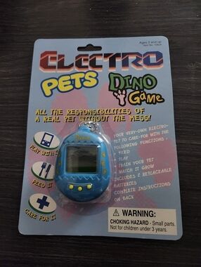 VINTAGE ELECTRO PETS DINO GAME BLUE TAMAGOTCHI LIKE KNOCK OFF VIRTUAL PET TOY